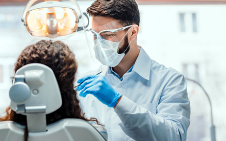 Patient in Clearwater talking to dentist about dental emergency