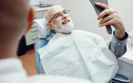 If you are missing many or all of your natural teeth, dentures may be an ideal solution for your smile