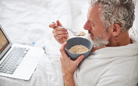 Man eating oatmeal