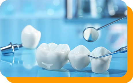 Dental bridge and dental mirror against light blue background