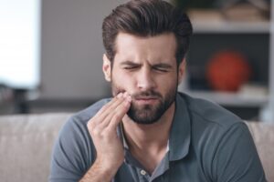 Man experiencing a severe toothache
